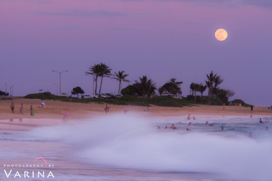 Photographing moon with single camera exposure at Sandy Beach, Oahu, Hawai'i by Varina Patel