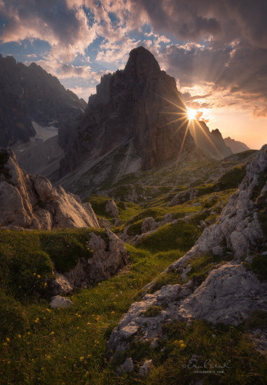Mountain photography with sunstar by Erin Babnik
